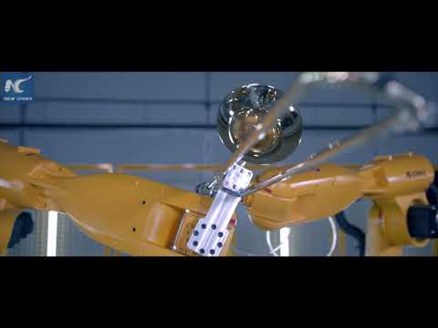 Industrial robots play traditional instruments