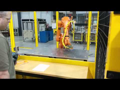 Khono Testing His Program on an IRC5 ABB Articulated Robot