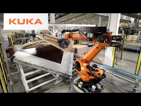 Origami with heavy-duty corrugated board: KUKA robots folding corrugated board in packaging industry
