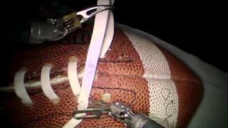 Seattle Doctor Laces Football Using da Vinci Robot