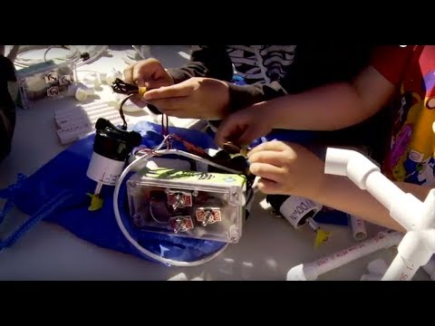 Underwater Robots Connect Topside and Underwater Worlds for Inuit