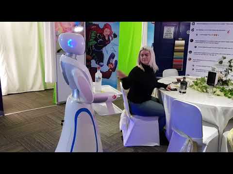 Amy Service Robot serving drinks to Amy